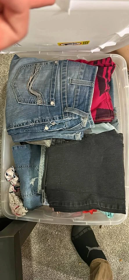 Bin of women’s clothes