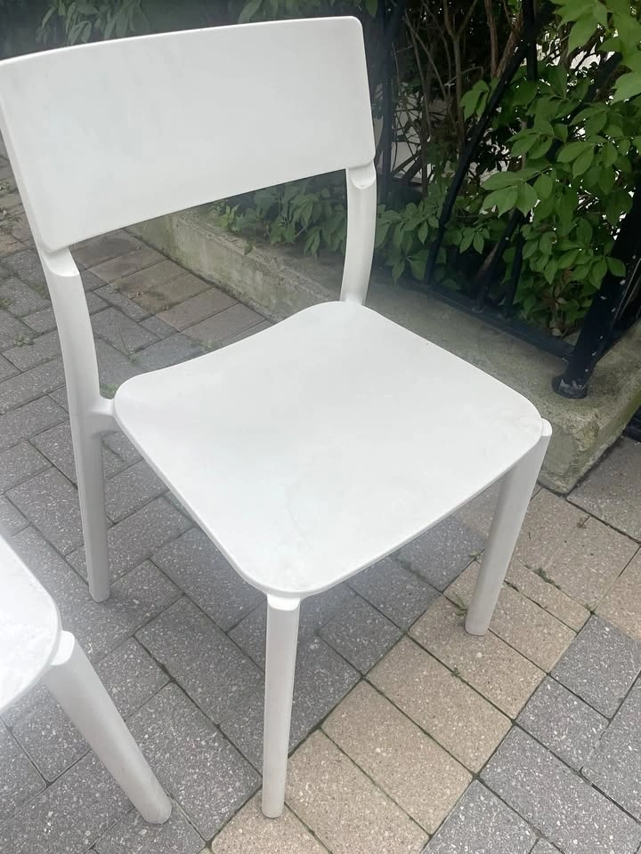 2 White Plastic chairs
