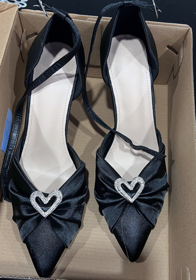Azry black Heels new condition size 8