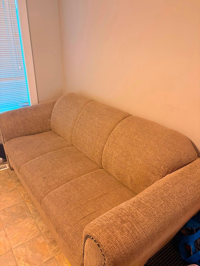 MOVING SALE! Tan Textured Three-Seat Sofa - photo 2