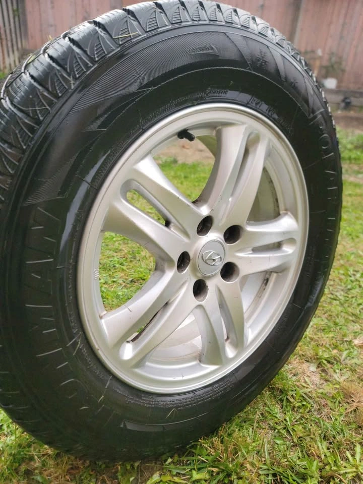 235/65 R17 Aluminum Rims with Tires - photo 2