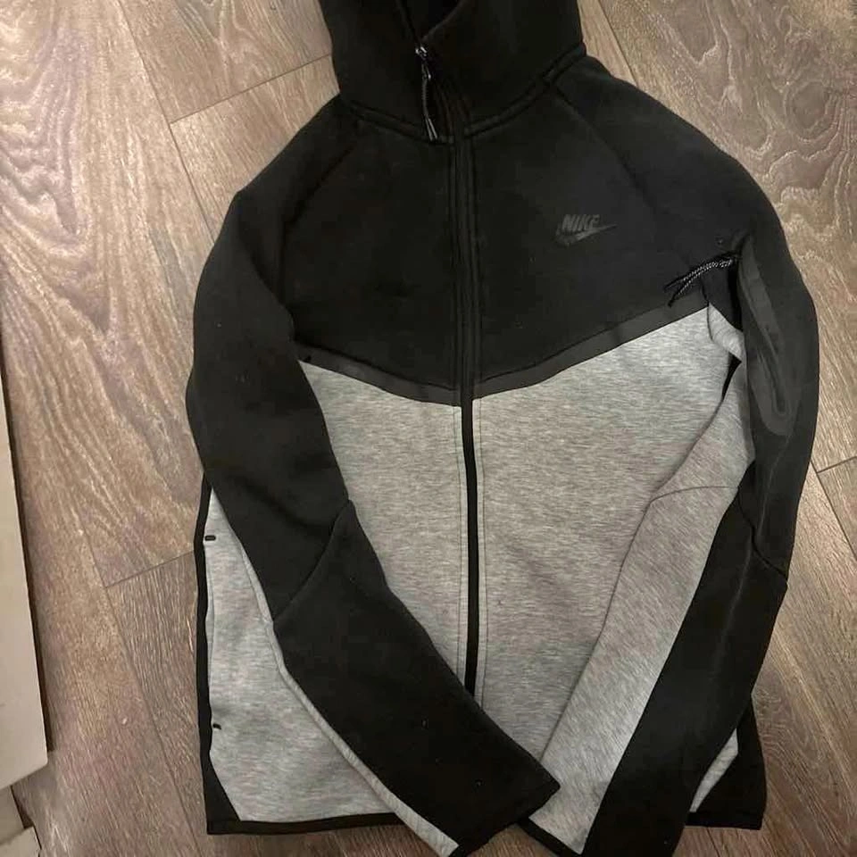 Black and grey Nike fleece tech