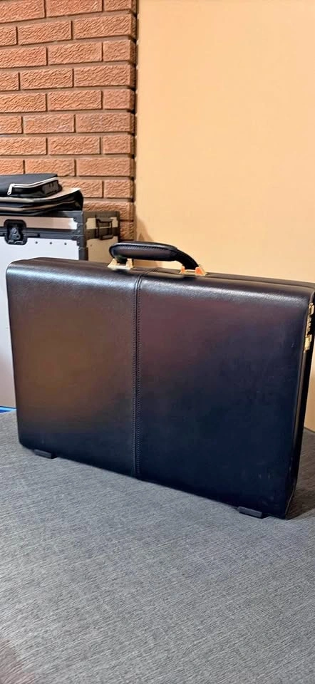 Black leather briefcase with combination lock