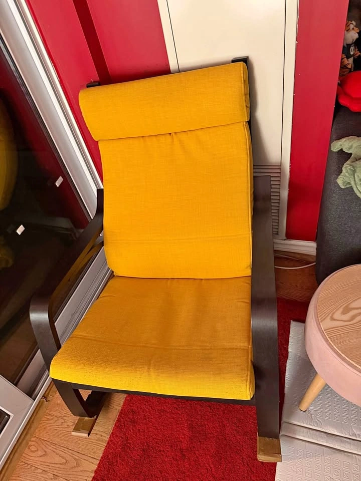 Yellow IKEA Poang rocking chair