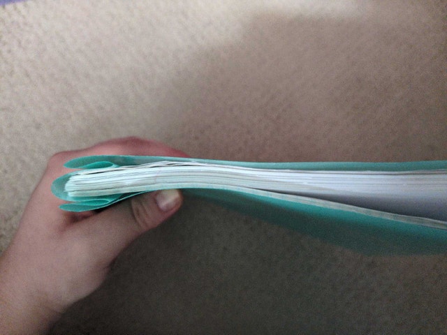 Two plastic report covers filled with paper - photo 3