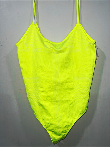 Nike Women’s Yellow One Piece Bodysuit Solid Logo Wireless Compr
