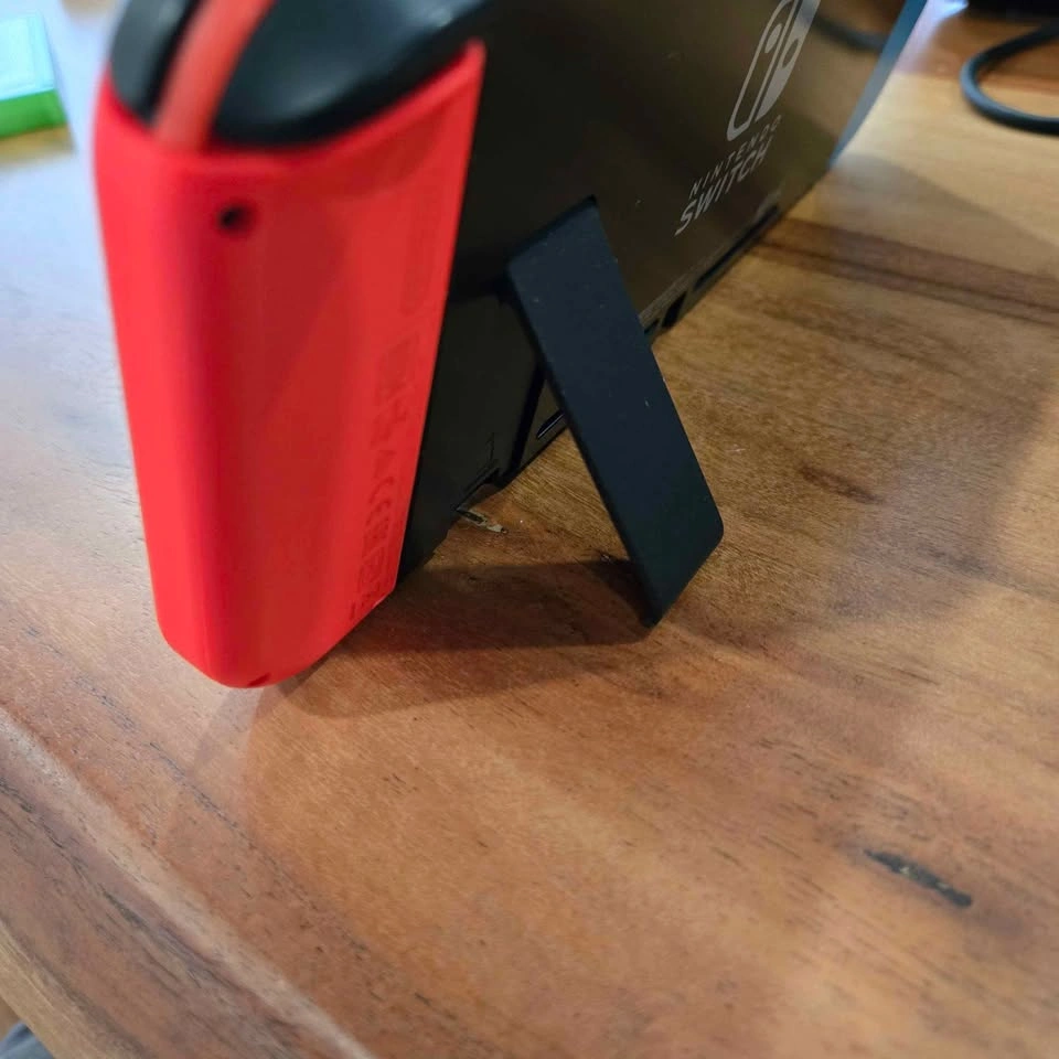 V1 Nintendo Switch. Clean Excellent condition, original charger, - photo 5