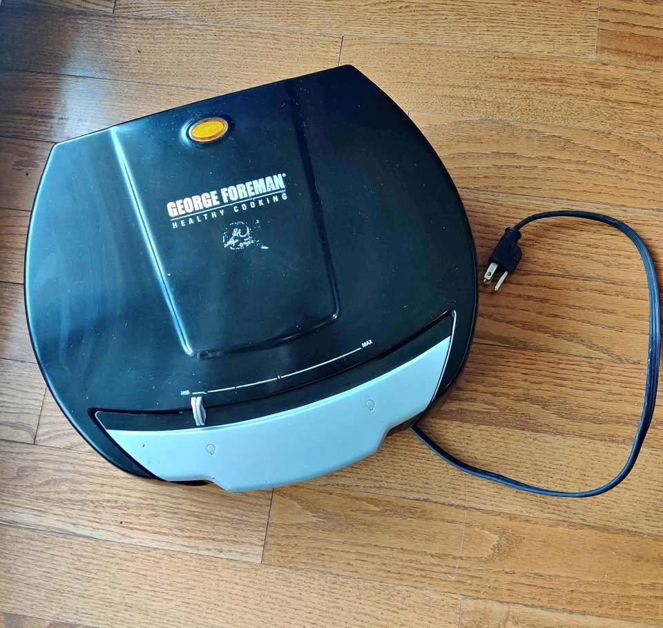 George Foreman grill press