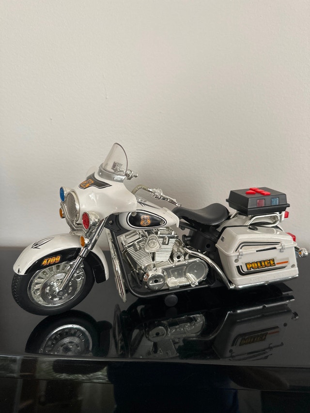Large-scale toy police patrol motorcycle