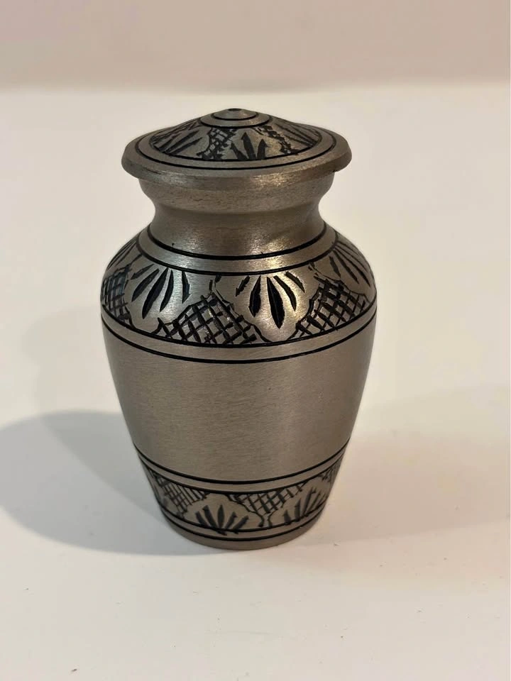 Small metal urn