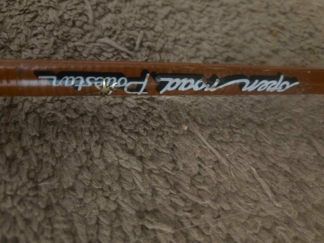 6 foot antique lucky rod and never used Shimano reel