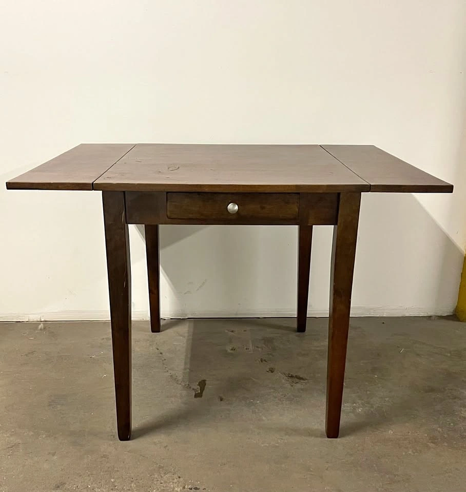 Double drop-leaf dining table