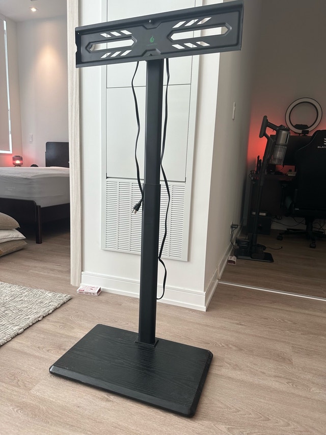 TV Stand – Height Adjustable, Swivel, Built-in Power Outlet