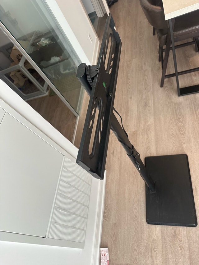 TV Stand – Height Adjustable, Swivel, Built-in Power Outlet - photo 2