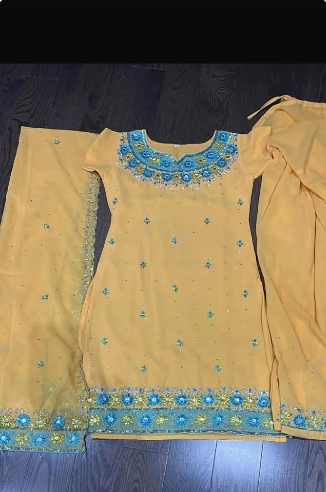 Set of 4 Beautiful Indian Suits image indicator(4)