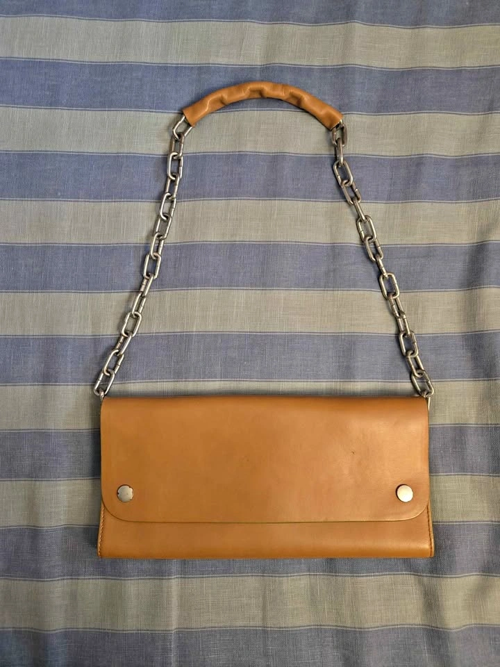ACNE STUDIOS LEATHER LONG FOLD OVER SHOULDER BAG IN CAMEL