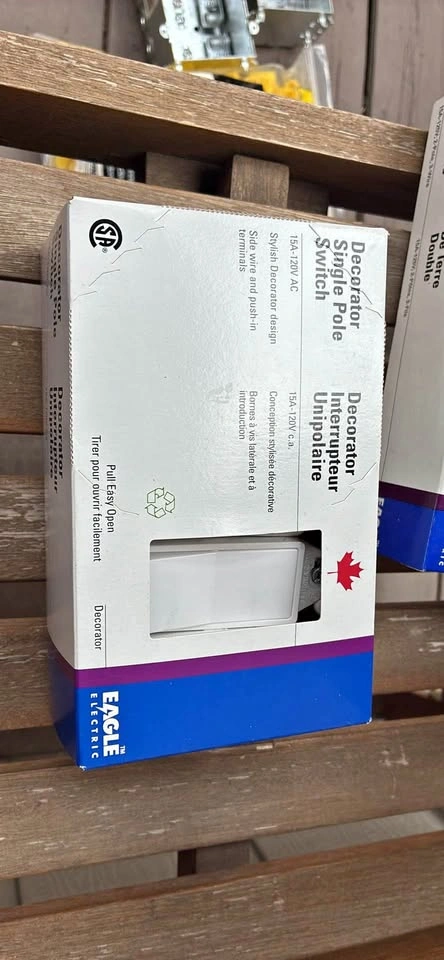 A single-pole decorator rocker switch box of 10