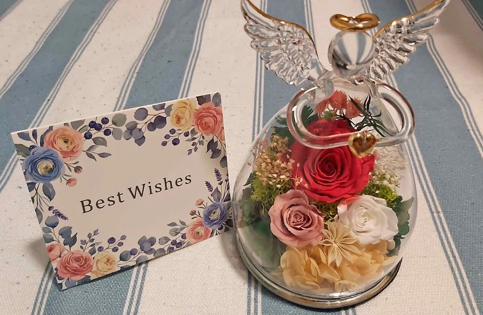 Glass Angel Figurine with preserved real roses and led light