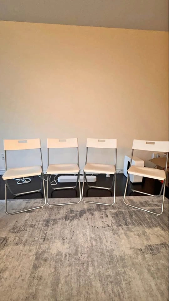 White folding chairs - set of 4