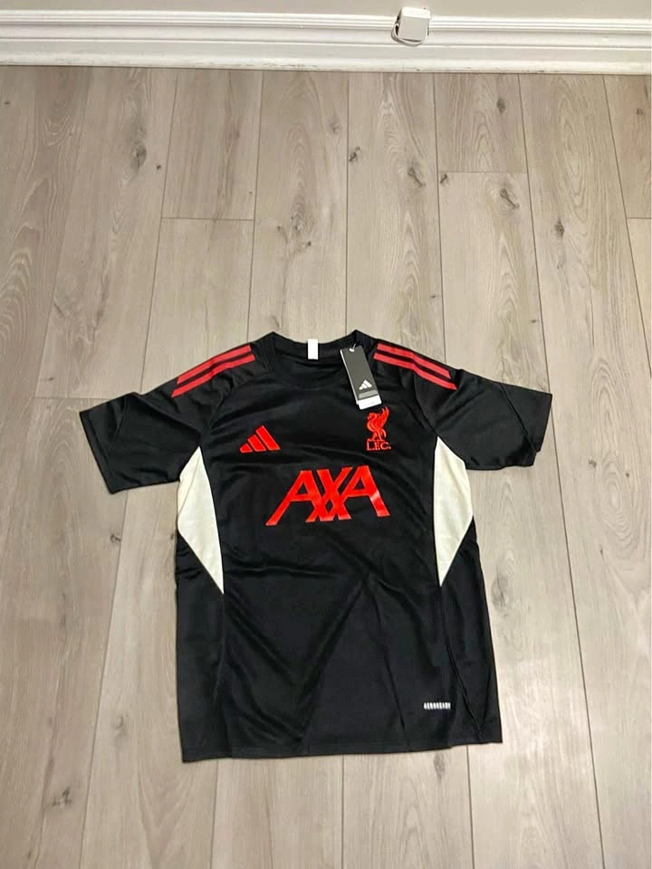 Brand new Liverpool FC training jersey, size small