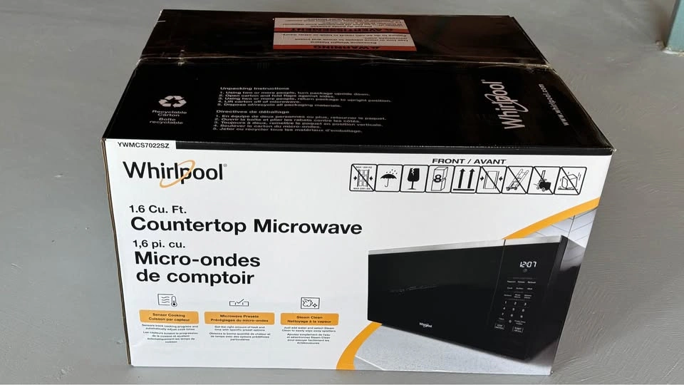 NEW Whirlpool 1.6 Cu. Ft. Countertop Microwave (YWMCS7022SZ) - photo 2
