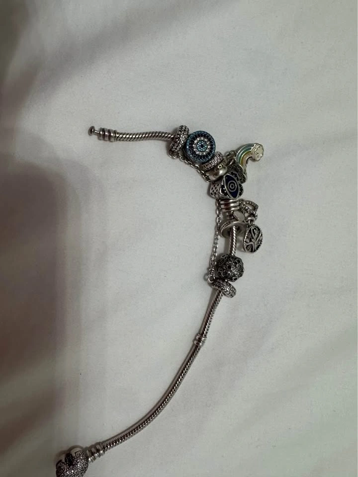 Authentic Pandora bracelet with extra charms