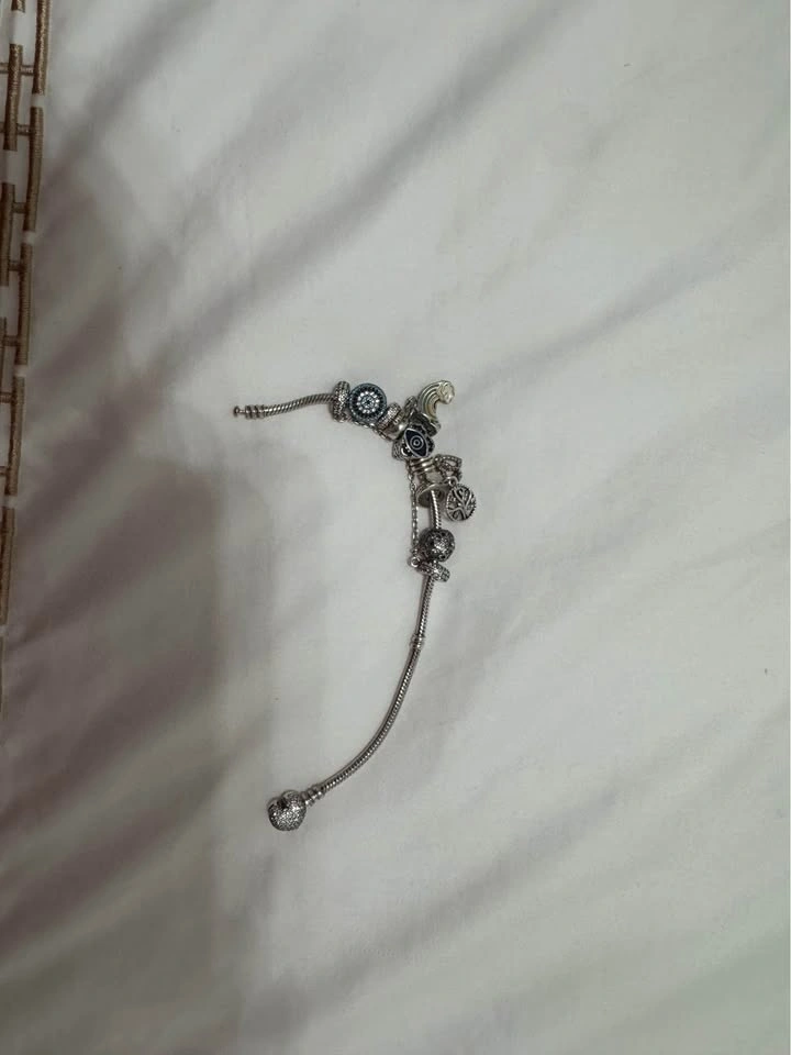Authentic Pandora bracelet with extra charms - photo 2