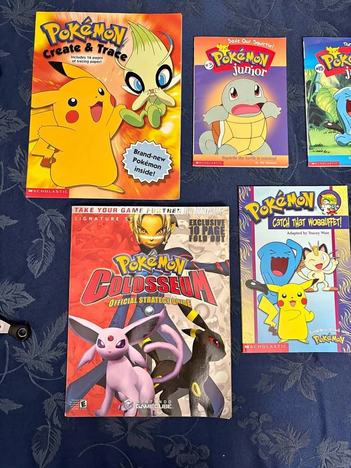 Pokemon books (11 total, including 1 colisium)