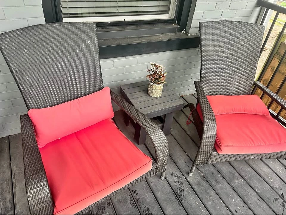 Two Red & Black Outdoor Chairs with two matching red Ottomans
