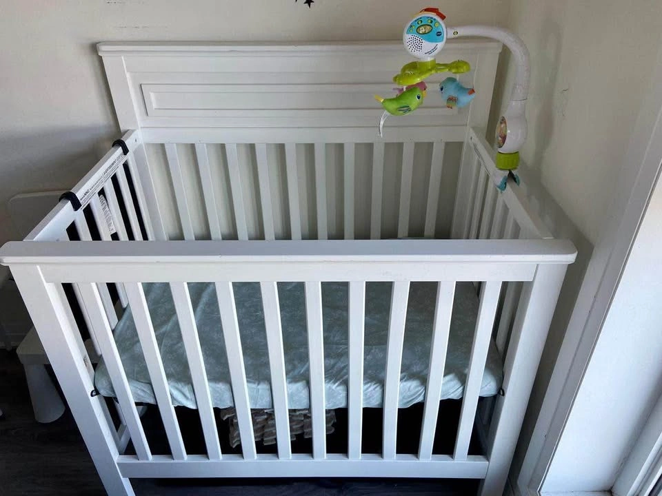 Crib with mattress, Crib mobile, Diaper caddy - photo 2