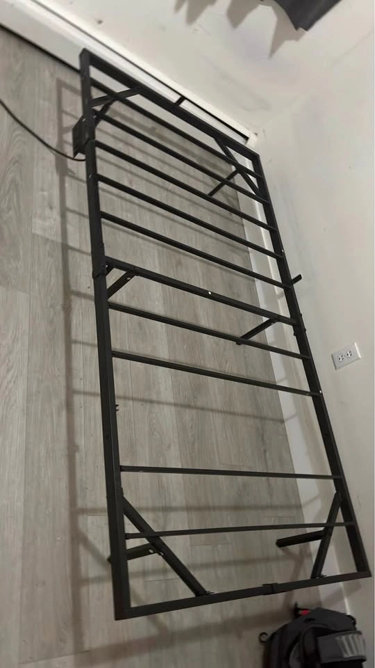 Bed frame for twin bed with power outlet