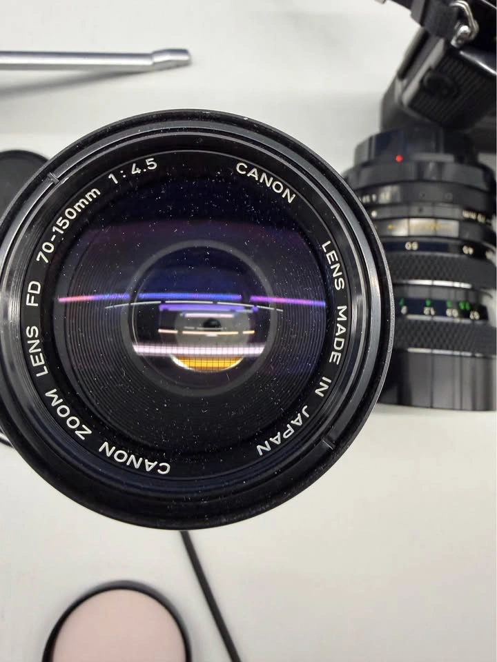 Canon A1 film camera with 3 different lenses - photo 3