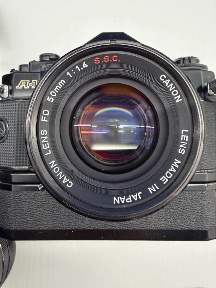 Canon A1 film camera with 3 different lenses - photo 5