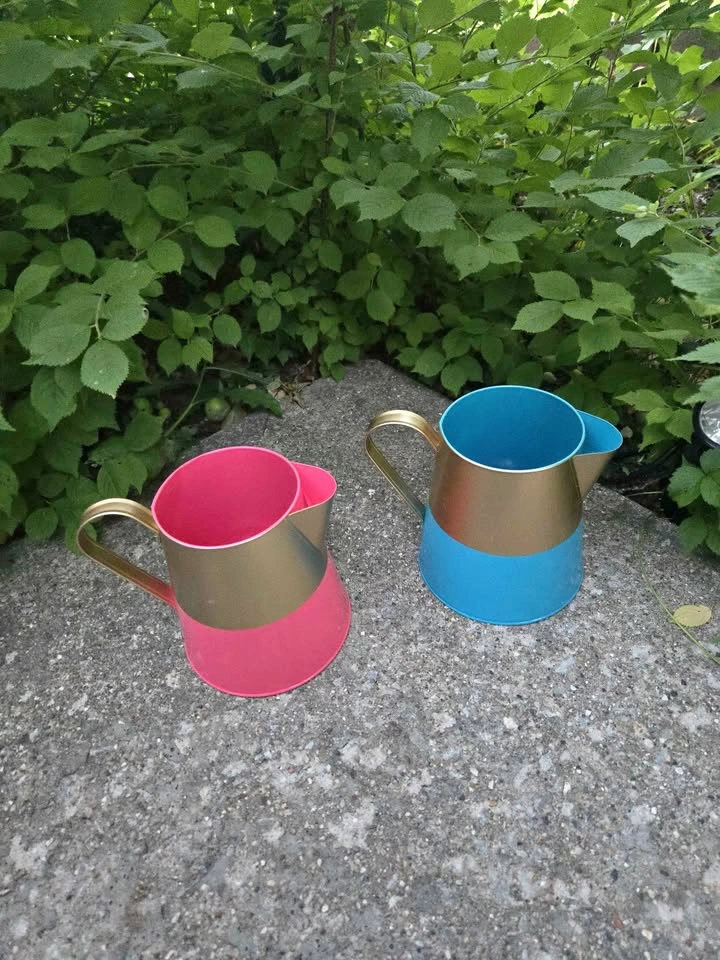 Brand new 2 watering cans