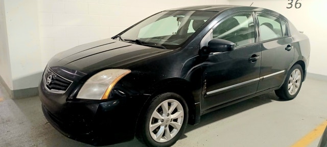 2012 Nissan Sentra – Drives Solid + Extra Winter Tires on Rims