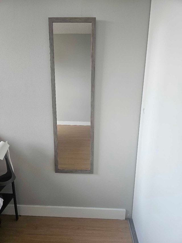 Mirror with wooden frame