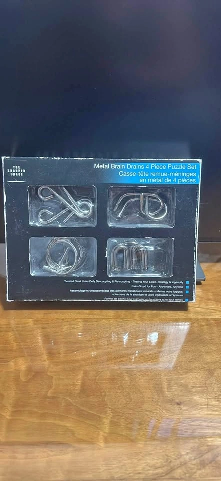 Metal brain drain puzzles - 4 pieces brand new