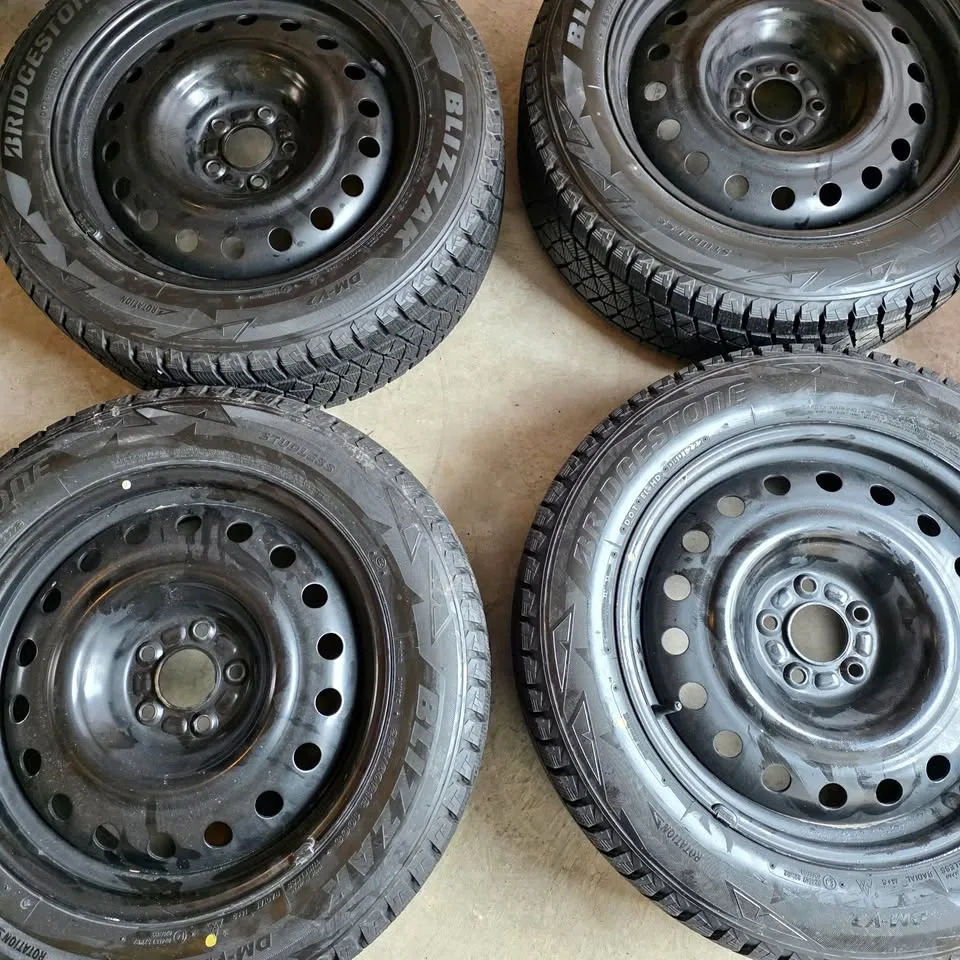 225/60/18 Bridgestone Winter Tires 95% Tread on Steel Rims