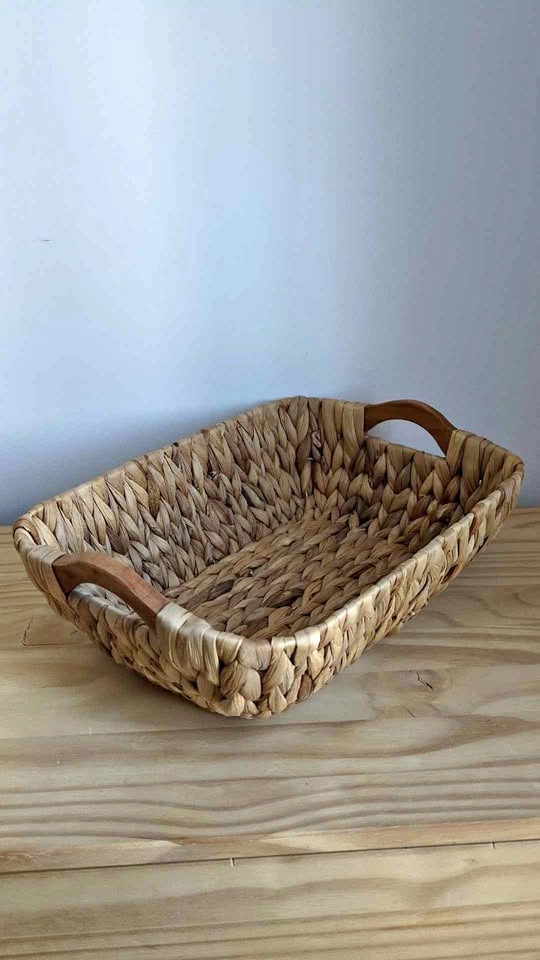Wicker basket with wooden handles