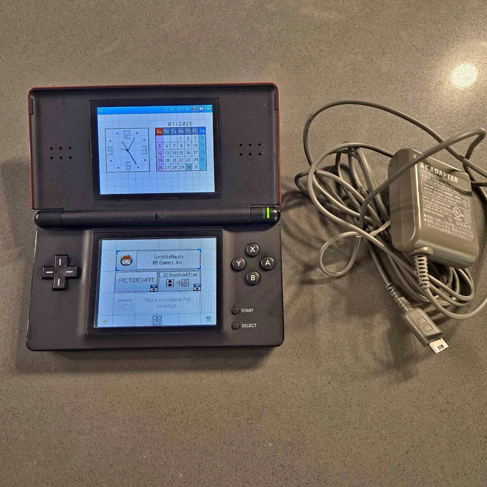Nintendo Ds Lite. Excellent condition. Charger, stylus inc.
