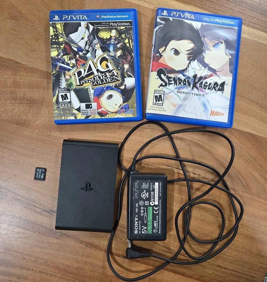 Playstation TV Vita bundle. Tested working. W/ games and 32gb ca
