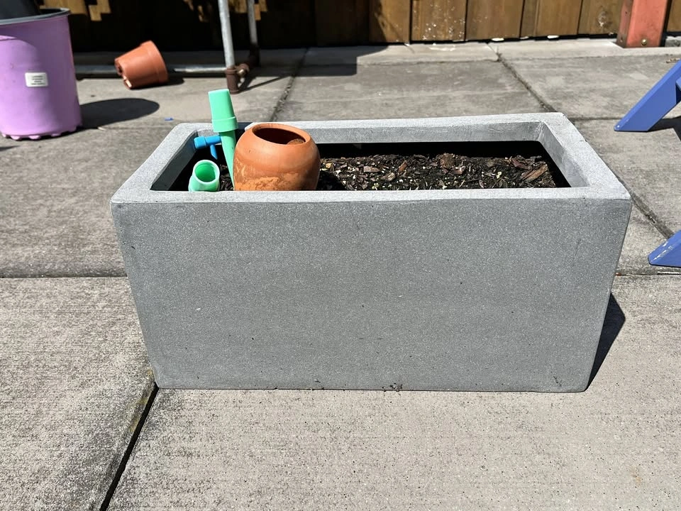 Concrete-look rectangular grey planter