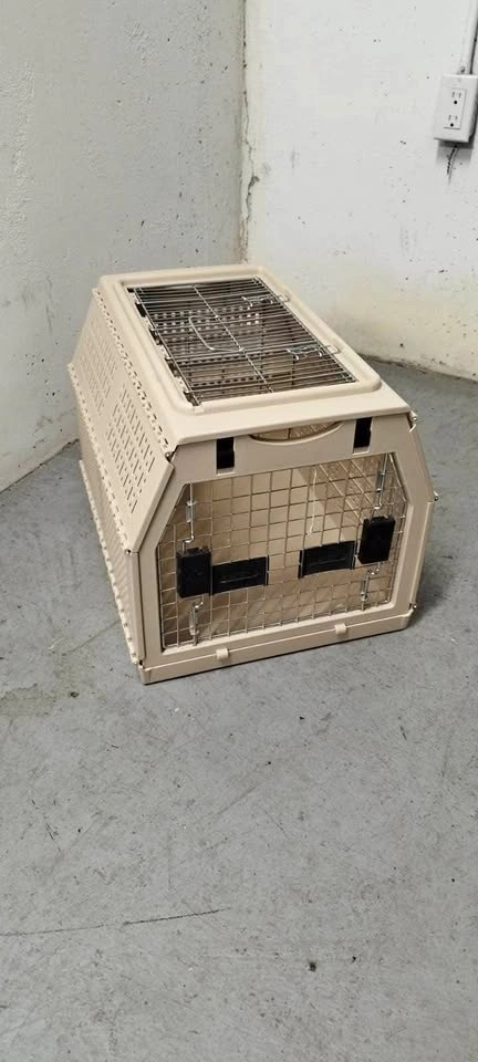 Collapsible beige pet carrier