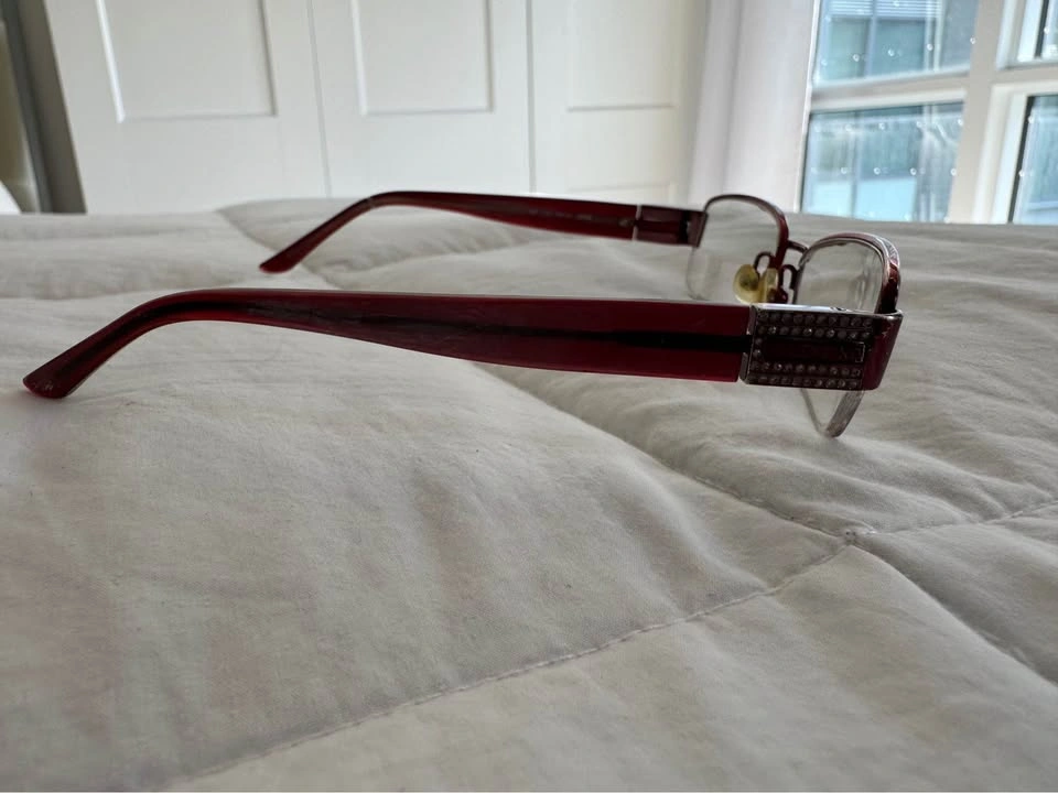 6 Pairs of Designer Eyeglasses: Prada, Gucci, and More - photo 3