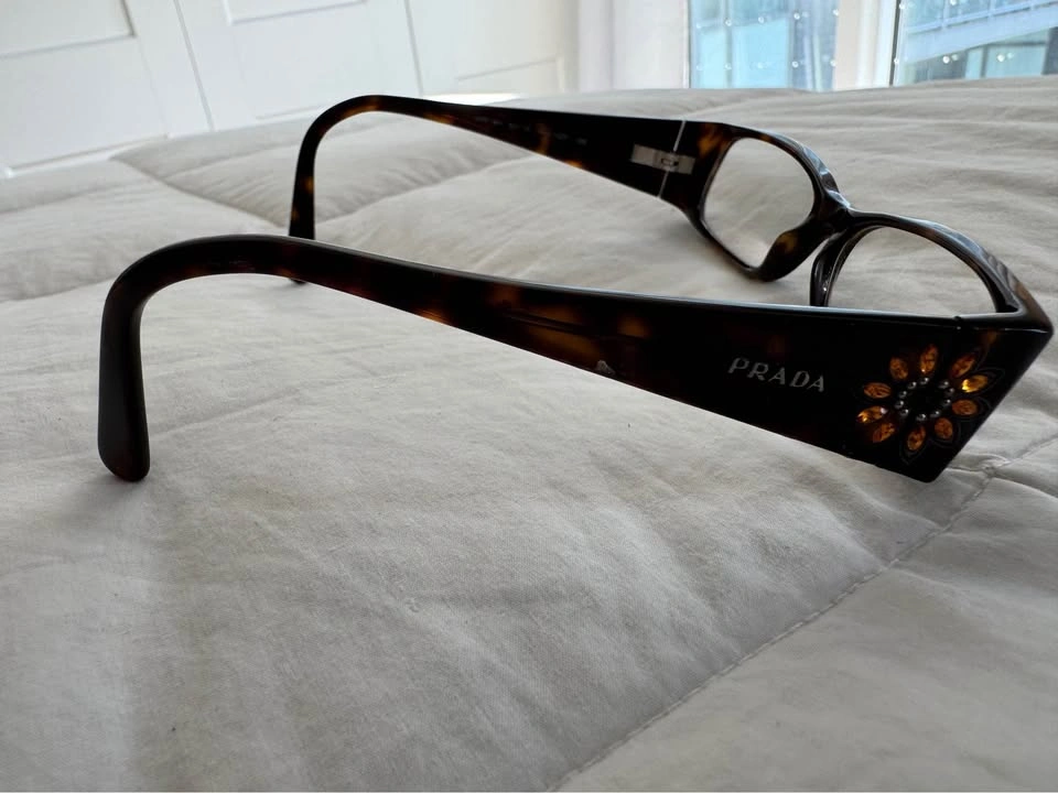 6 Pairs of Designer Eyeglasses: Prada, Gucci, and More - photo 5