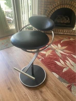 Black leather and chrome barstool