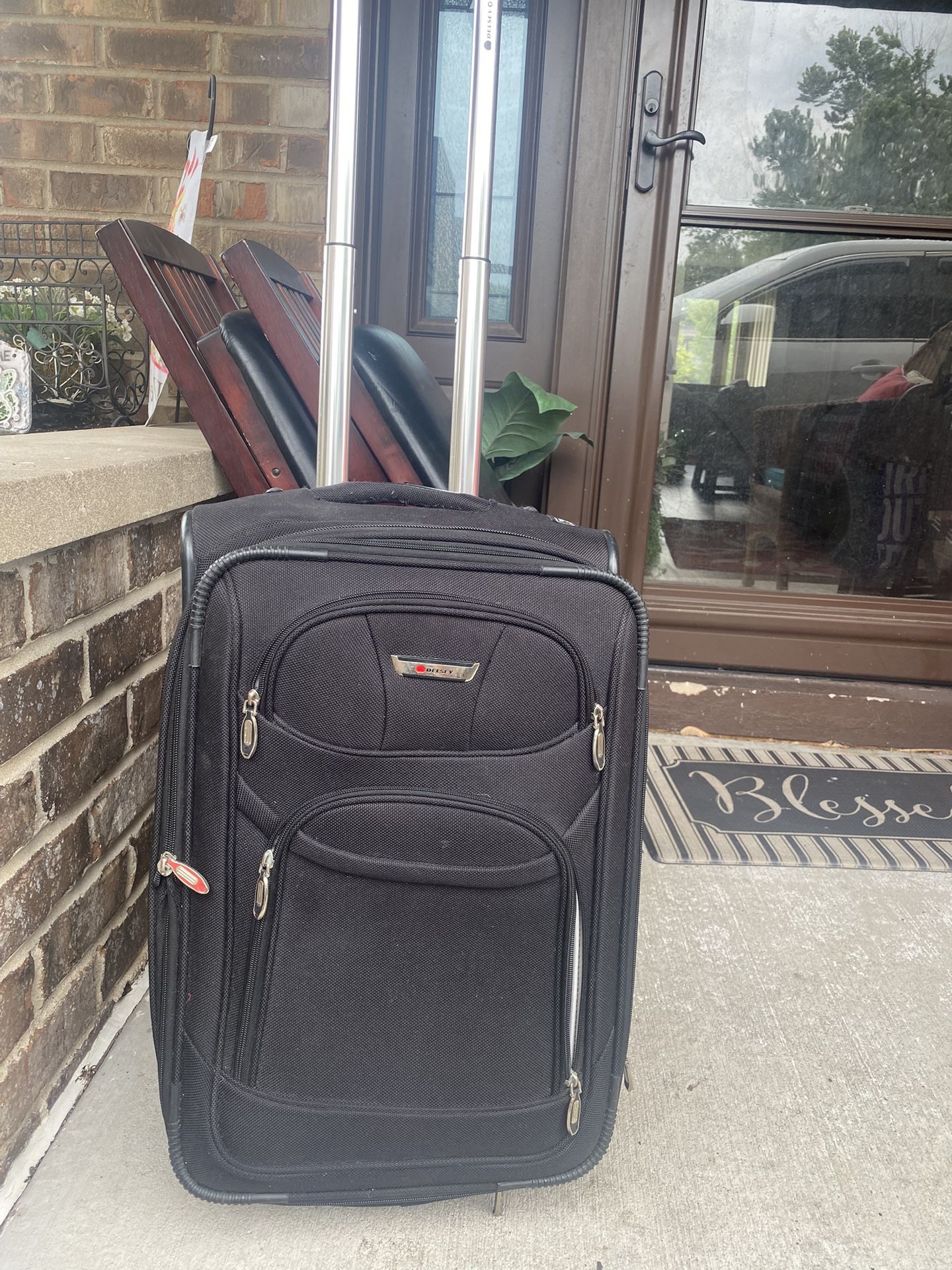 Like New Delsey Carryon Suitcase/luggage