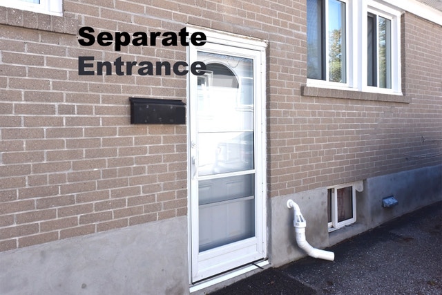 Spacious 2-Bedroom Basement Apartment for Rent - photo 2