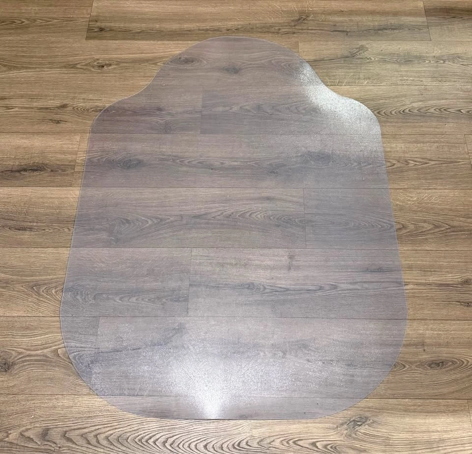 Transparent protective floor mat for office chairs