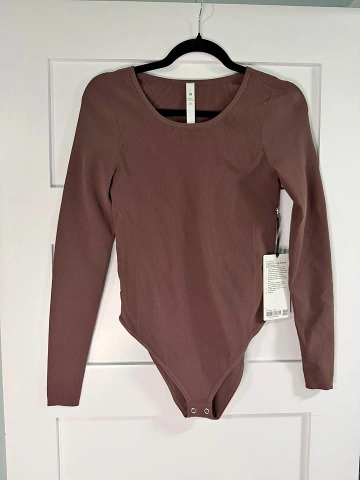 Lululemon body suit- new, large